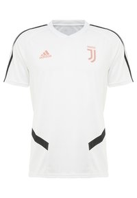 Vit Juventus fotbollströja med svarta detaljer, V-ringad design och rosa logotyp. Tillverkad av lättviktsmaterial. Har meshinsatser på sidorna.