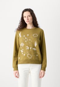 Sweatshirt vert olive avec broderie florale blanche et motifs tourbillonnants, à col rond et poignets côtelés, fabriqué en coton doux.