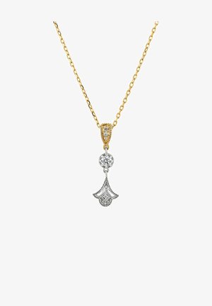 Collar de cadena dorada con un colgante plateado que presenta un diseño floral, una piedra clara redonda y un detallado intrincado en el colgante.