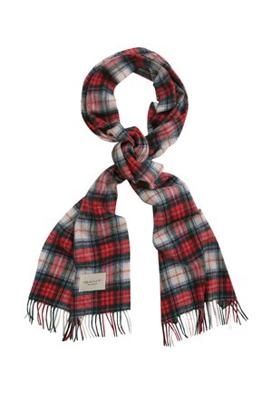 Roter, grüner und weißer karierter Wollschal mit fransigen Enden, locker gebunden, mit einem kleinen rechteckigen Markenlabel aus Stoff.