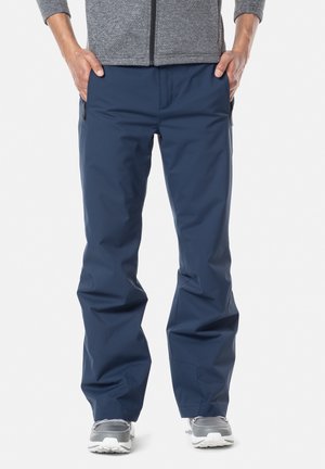 Marine waterdichte broek met een rechte pasvorm, voorzien van zijzakken met rits en een gladde, glanzende textuur. Geschikt voor buitenactiviteiten.