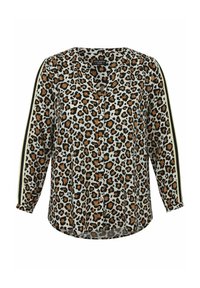 Leopardprint blouse met zwarte en bruine vlekken op een crèmekleurige achtergrond, met een knoopsluiting aan de voorkant en zijstripes in geel en zwart.
