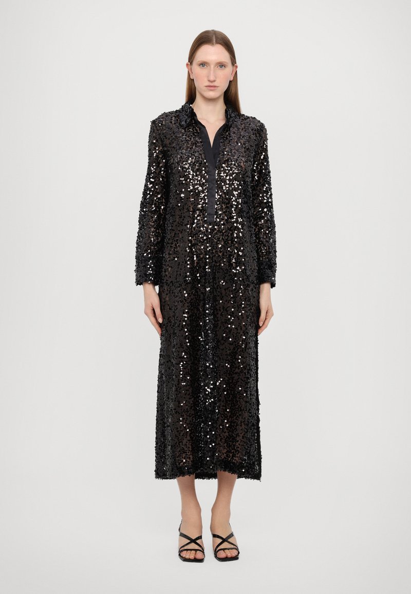 Black sequin dress featuring a collar, long sleeves, and a straight silhouette. The texture is shiny and reflective with a smooth inner lining.