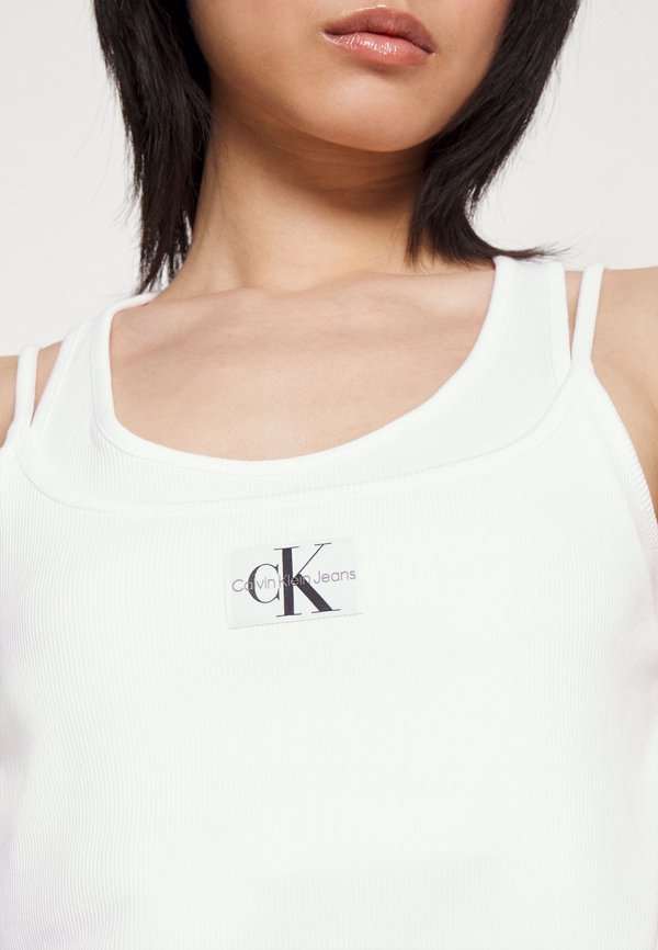 BADGE DOUBLE LAYER - Top4