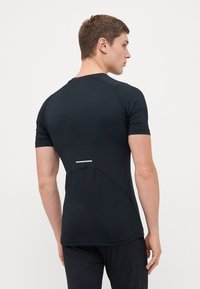 Champion TRAINING KOMPRESSION - Sport T-Shirt - black