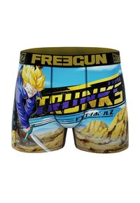 Boxers pour hommes noirs et jaunes avec un graphisme de Trunks de Dragon Ball Z, sur fond bleu avec un motif de paysage désertique.