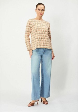 Stickad tröja - beige