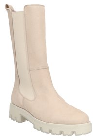 Béžová kožená kotníková bota s elastickými bočními panely, kulatou špičkou a strukturovanou podrážkou, s robustní, mírně vyvýšenou platformou.