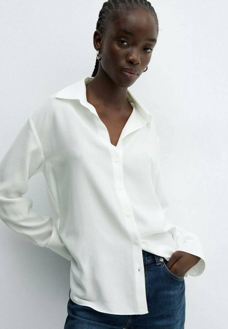 short denim dresses for women Savannah Medium Wash V Neck Sleeveless Denim Mini Dress S / Medium Wash