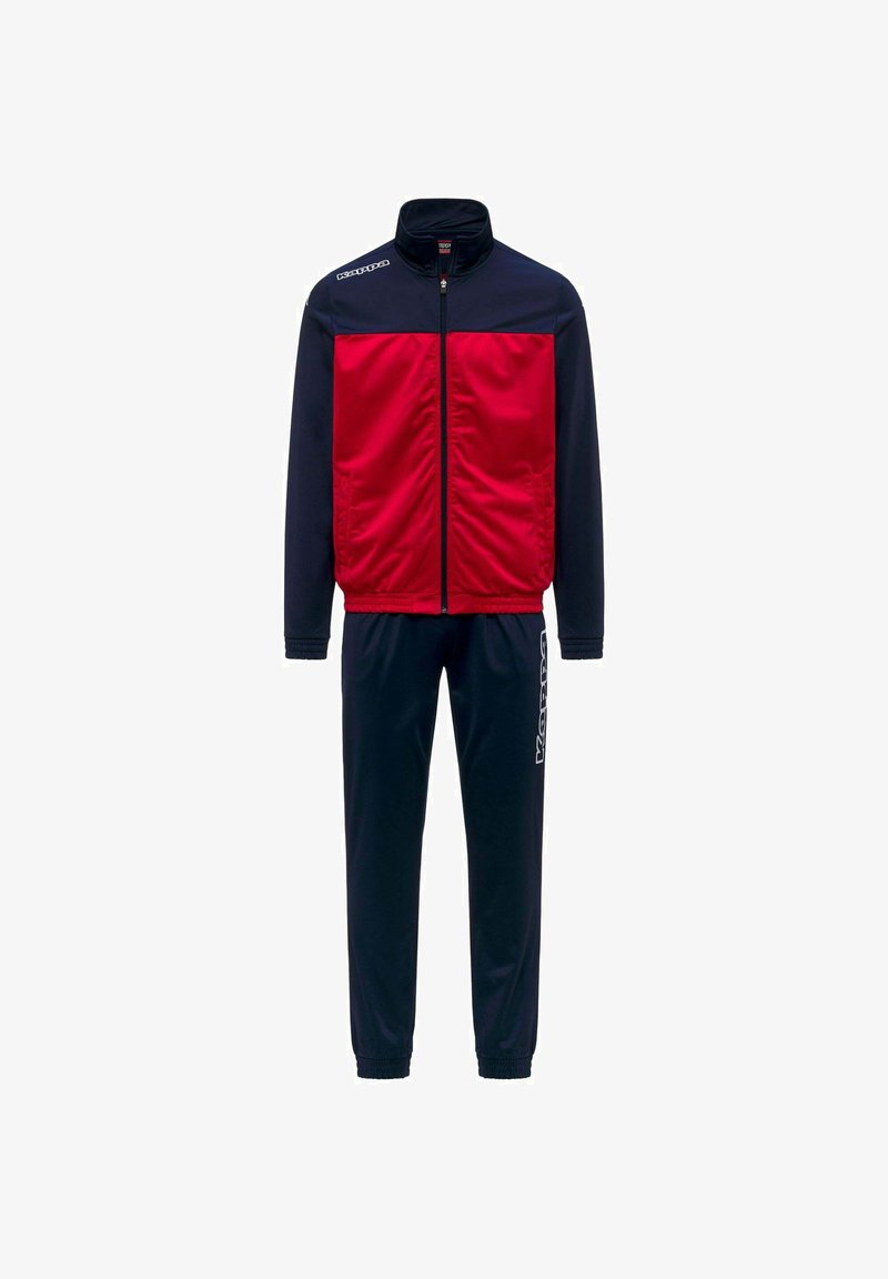 Survêtement avec manches et pantalons bleu marine, panneau avant rouge de la veste, fermeture éclair complète et texte de logo blanc sur l'épaule et la jambe du pantalon.