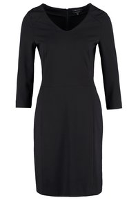 Robe noire avec manches trois-quarts, encolure en V, silhouette ajustée, coupe au genou, fabriquée en tissu lisse, fermeture éclair au dos.