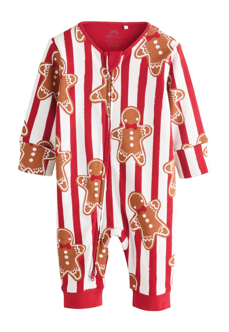 Czerwono-biały pasiasty kombinezon z motywem piernikowych ludzików. Wykonany z miękkiej tkaniny, posiada długie rękawy oraz przedni suwak ułatwiający ubieranie.