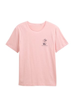 Lys pink kortærmet T-shirt lavet af blødt stof. Har en mørk trykt illustration af en drink og ordet "HAVANA." Rund halsudskæring.