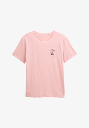 T-shirt rose clair à manches courtes en tissu doux. Présente une illustration imprimée sombre d'une boisson et le mot "HAVANA". Col rond.
