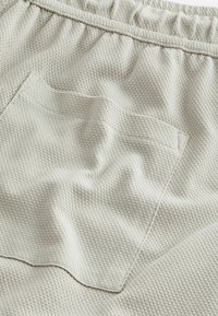Next STAG - Donji dijelovi trenirke - bone cream textured