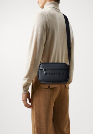 ESSENTIAL - Cross body bag - black