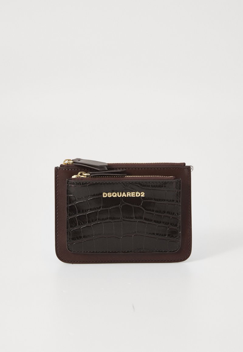 Brown leather wallet with a textured black crocodile-print front, gold logo detail, and a zippered compartment at the top.