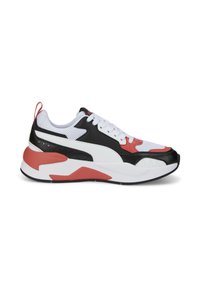 Sneaker nero, bianco e rosso con tomaia in rete, accenti in pelle a contrasto, suola spessa e un pratico pull tab sul tallone.