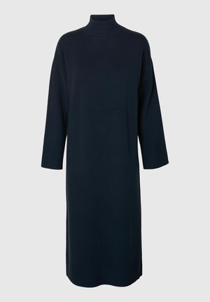 Navy turtleneck dress made of soft fabric, featuring three-quarter sleeves and a straight cut with side slits for added movement.