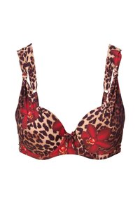 Sujeta de leopardo con acentos florales rojos, copas moldeadas y lazos decorativos en las correas. Presenta una textura de tela suave y herrajes metálicos.