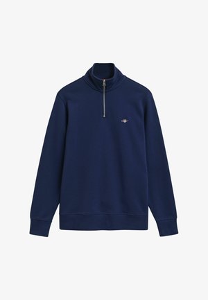 Marineblauer Langarm-Pullover mit einem Viertel-Reißverschluss auf der Vorderseite und kleinem gestickten Logo auf der linken Brust.