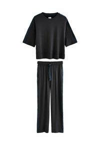Black short-sleeve loose fit top with dark side stripes paired with matching elastic waist wide-leg pants with side stripes and front tie.