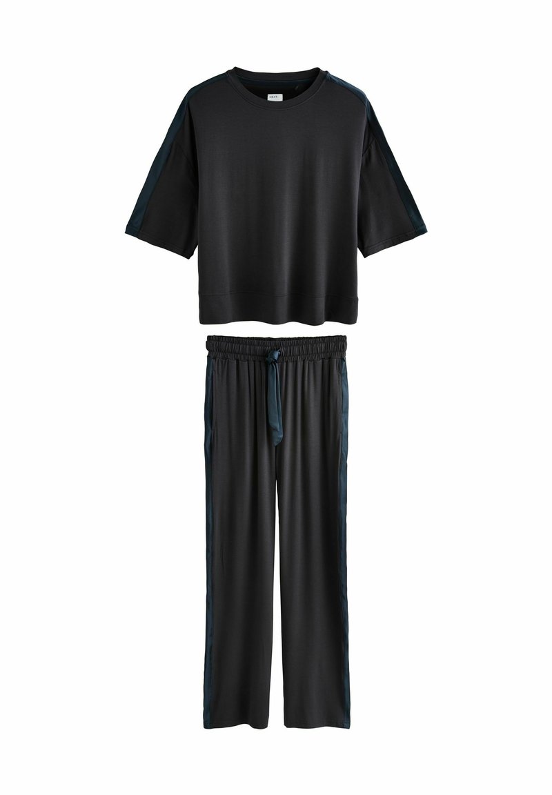 Black short-sleeve loose fit top with dark side stripes paired with matching elastic waist wide-leg pants with side stripes and front tie.