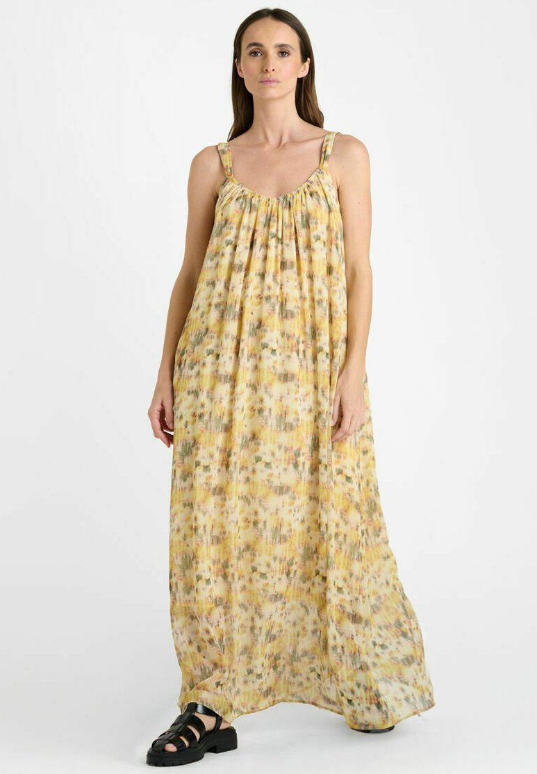 Maxi-jurk van lichtgewicht, bloemenpatroon stof. Gele basis met groene en bruine accenten, voorzien van verstelbare schouderbanden en een geraffineerde bustedetail.