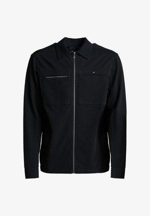 Schwarze Jacke mit Reißverschluss vorne, zwei Brusttaschen und einem Kragen. Hergestellt aus weichem Material mit glatter Textur und figurbetonendem Design.