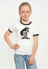 White cotton t-shirt with navy ribbed collar and sleeves, featuring a cartoon mole character digging in dirt, colored in shades of gray and brown.