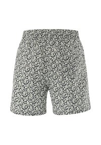 Blumenmuster-Shorts mit elastischem Bund. Dunkelmarine Hintergrund mit kleinen weißen Blumen. Weicher Stoff, lässiges Design, Oberschenkel-lange.