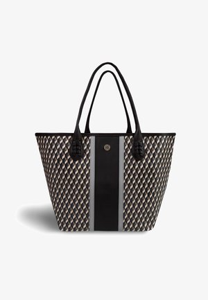 Sac en toile tissé avec un motif géométrique marron et crème, présentant une bande centrale noire et des poignées noires élégantes. Surface texturée.