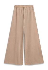 Pantalons larges beiges avec une taille élastique et un cordon de serrage. Tissu doux, texture lisse et coupe décontractée avec poches latérales.