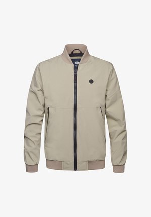 Vaaleanbeige bomber-takki, joka on valmistettu sileästä kankaasta. Takissa on vetoketju edessä, musta vetoketju, sivutaskut ja resorit hihansuissa, joissa on pyöreä logokoriste.