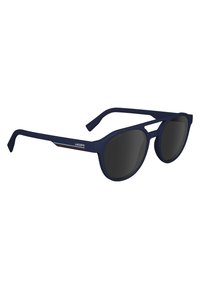 Ochelari de soare din plastic navy cu lentile întunecate. Caracteristici includ un design elegant, linie dreaptă a sprâncenei și logo-ul Lacoste pe braț, cu accente de culoare.