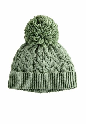 Bonnet en tricot de couleur vert clair, avec un design en cable texturé, un ourlet côtelé et un grand pompon sur le dessus. Matériau doux et confortable.