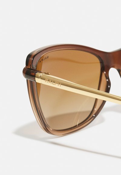 RALPH Ralph Lauren Päikeseprillid - shiny transparent brown