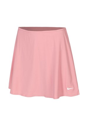 Vaaleanpunainen urheiluhame, joka on valmistettu kevyestä kankaasta. Ominaisuuksiin kuuluu röyhelömuotoilu ja valkoinen Nike-logo vasemmalla alhaalla.