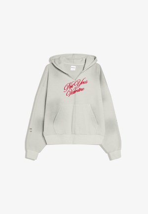 Felpa con cappuccio grigio chiaro con tasca frontale e scritta in corsivo rosso "Not Your Valentine" sul petto, con cappuccio e polsini a costine.