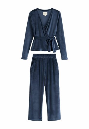 Navy blue velour loungewear set featuring a wrap-style long-sleeve top with a tie and wide-leg pants with elastic waistband and pockets.