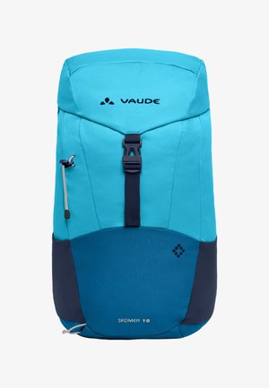 Blauwe en marineblauwe Vaude Skomer 18 rugzak met bovenklep en sluiting met gesp aan de voorkant, zijlussen en compact ontwerp.
