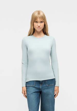 - Bluzka z długim rękawem