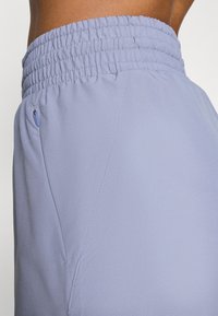 Salomon CORE - Sports shorts - blue granite