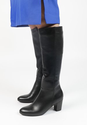 Black leather knee-high boots with a pointed toe and block heel, featuring a smooth texture and minimal stitching detail.