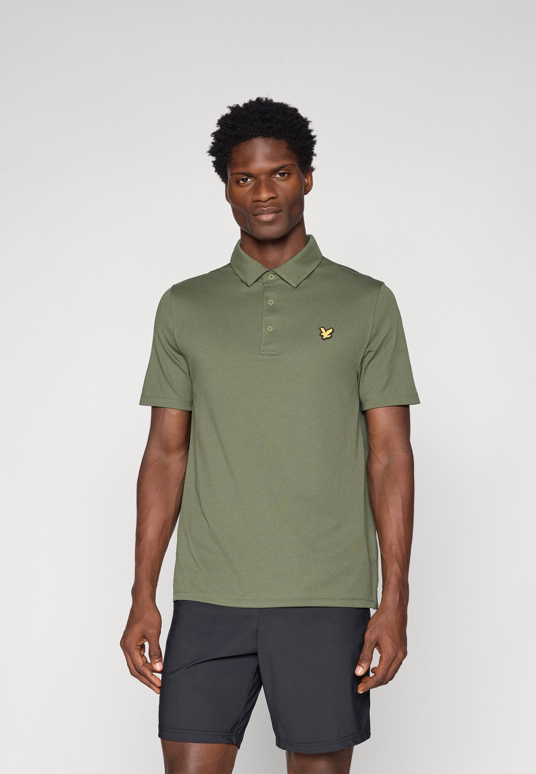 dark green golf shirts