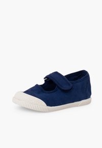 Chaussure enfant en toile bleu marine avec semelle en caoutchouc blanche, embout renforcé et une bride ajustable à velcro.