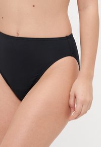 Zwarte bikinionderbroek met hoge taille van gladde stof, met een klassieke vorm, zijkapjes en elastische tailleband.