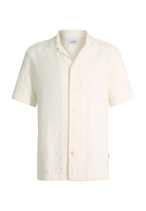 Chemise à manches courtes texturée blanc cassé avec boutons, col camp et motif géométrique subtil.