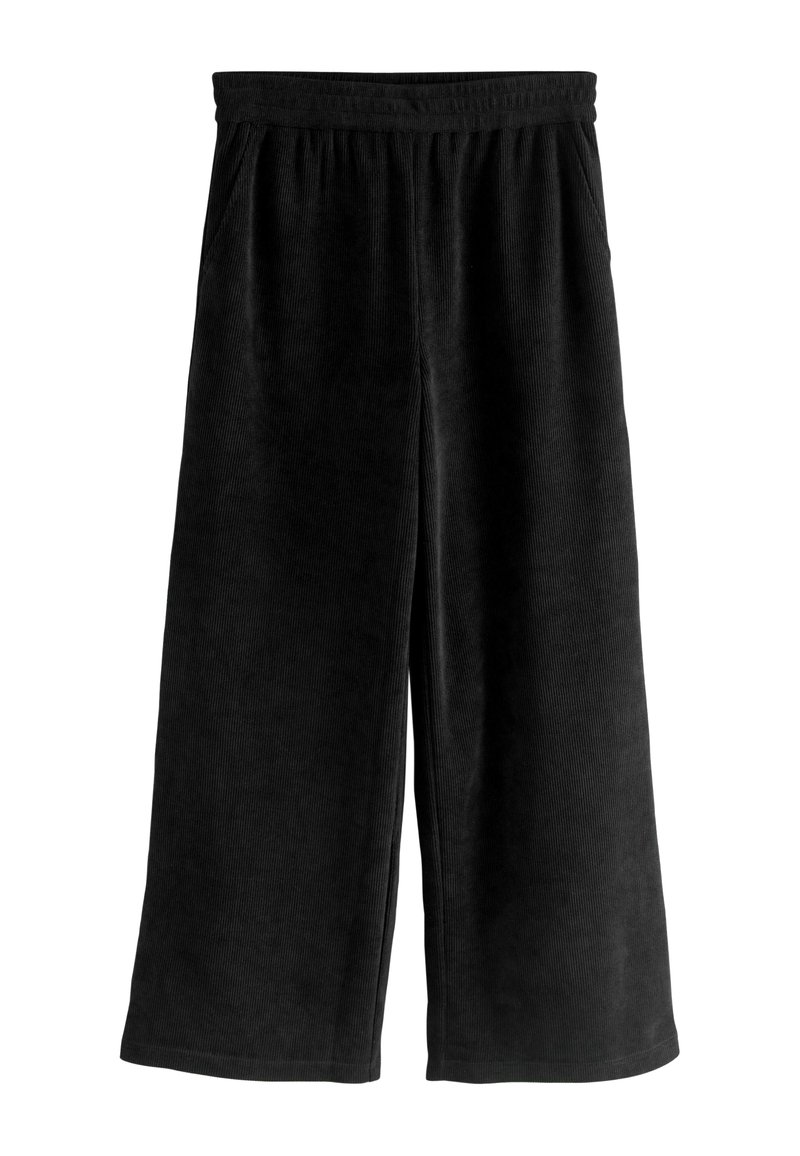 Zwarte corduroy brede broek met een elastische tailleband en zijzakken. De stof heeft een ribbelstructuur en een gladde afwerking.