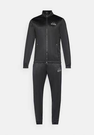 Black tracksuit featuring a zip-up jacket and elastic waistband pants. Made from smooth, lightweight fabric with logo accents.